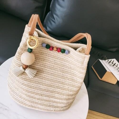 Womens wooden beads decoration leisure straw bag shoulder woven bucket bag wild tassels hair ball beach handbag
