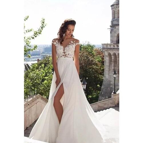 Simple Elegant Chiffon Bohemian Wedding Dresses 2021 Sheer Neck Lace Appliques Cap Sleeves Thigh-High Slits Beach Bridal Gowns