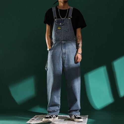 Denim overalls men fashion Jumpsuits Solid Suspender Pants Safari Style loose jeans Straight leg jeans baggy jeans Rompers