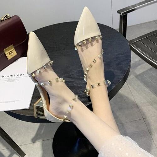 2021 spring and summer new female Baotou mid-heeled high heels fashion all-match rivet pointed shallow mouth sandals