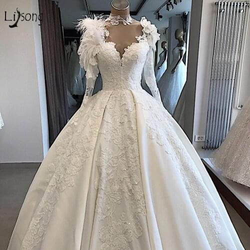 Demure Floral Lace Puffy Wedding Dresses Vintage 3D Flower Feather Bridal Gowns See Thru Back Pearls Ball Gowns Robe De Mariee