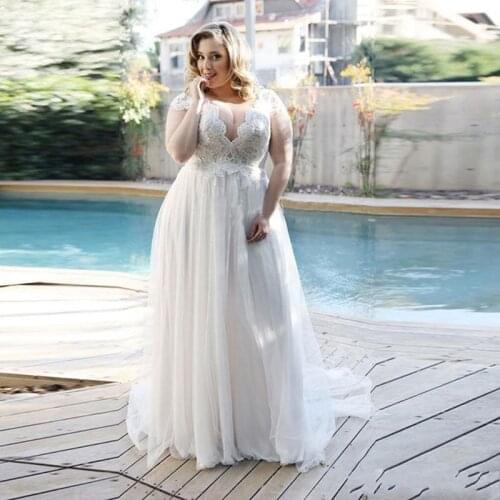 Plus Size Beach Lace Wedding Dresses 2020 V Neck Short Sleeves Sweep Train Modern Garden Beach Bridal Gowns Vestido De Novia