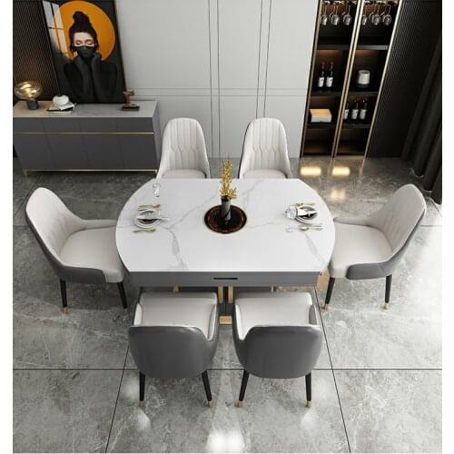 Hong Kong style light luxury dining table and chair combination postmodern simple rectangular 8 people stainless steel furniture