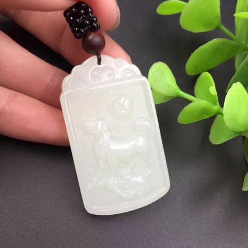 Natural Xinjiang Hetian jade white zodiac dog pendant 43 * 25 * 8mm with certificate