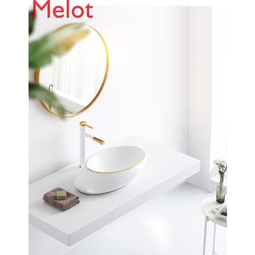 Modern simple Nordic gold stage basin toilet creative wash basin oval wash basin art basin