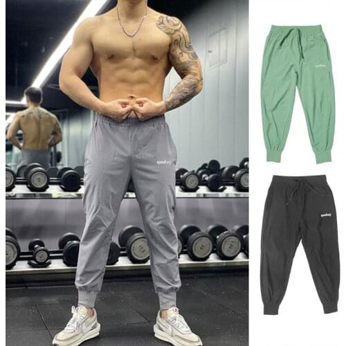 2021 New Men Joggers Trackpants Slim Fit Pants Bodybuilding Trousers Jogging quick-drying Sweatpants Running Pants Gyms Pants