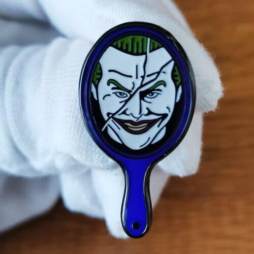 Mirror joker brooch