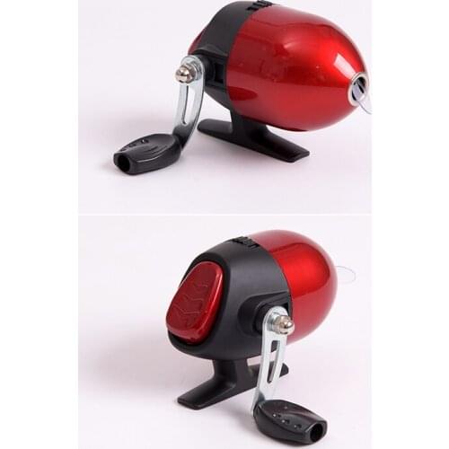 New hot Outlife fish Close up of a fishing reel spinning a cast fishing line