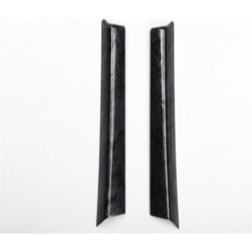 Peach wood interior modified with carbon fiber stickers on both sides of the water cup holder for Volvo S60 2014-2018 on left