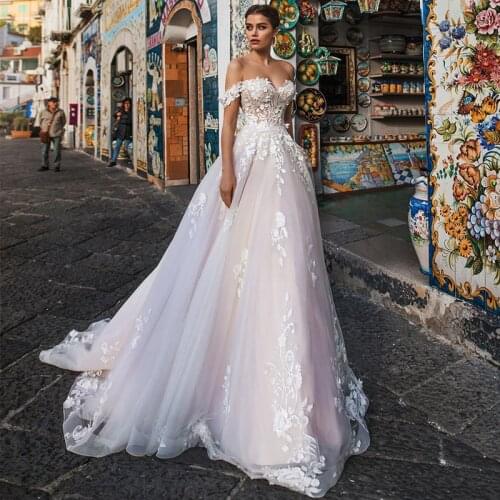 Gorgeous A-line Tulle Wedding Dress 2021 Sexy Sweetheaert Appliques Lace Court Train Backless Off the shoulder Bridal Gowns