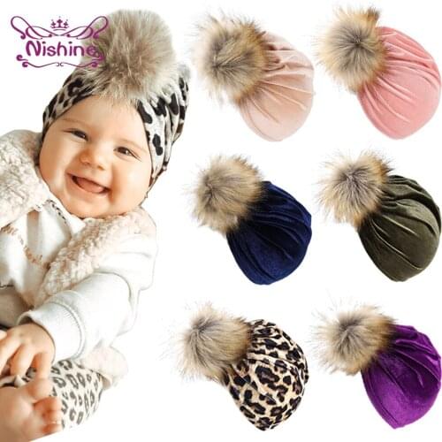 Nishine Infant Beanie with Faux Fur Ball Hat Soft Velvet Newborn Cap Toddler Girl Bonnet Headwear Kid Photography Props