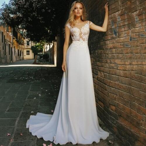 Cap Sleeve See Through Top Back Scoop Appliques Lace A-Line Buttons Tulle Wedding Dress 2021 Vestido De Noiva Bridal Gown