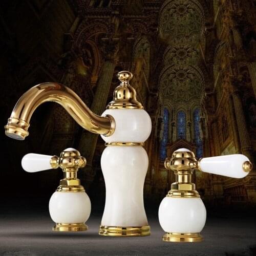 Luxury gold brass bathroom sink faucet Two handle three holes High-grade stone basin faucet mixer Hot and cold water tap