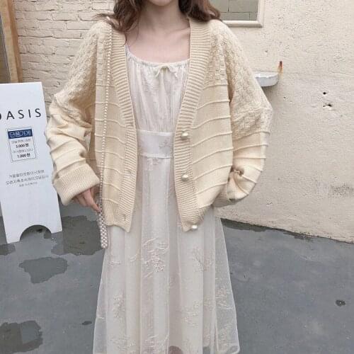 Autumn and winter Japanese knitted cardigan 2021 new Korean version of loose v-neck long-sleeved solid color coat jacket women