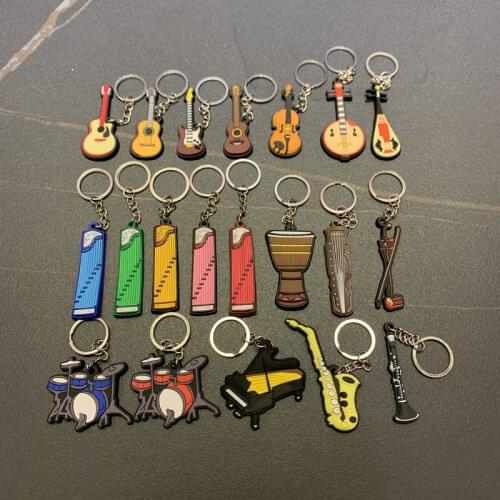 Musucal instrument keychains Guitar Violin viola cello Guqin Drum Piano African drum Guzheng saxophone pipe