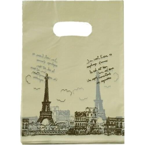 50pcs/lot 25x35cm Tower Print Yellow Plastic Bags Favor Snacks Gifts Jewelry Packaging Bags Cute Plastic Gift Bag With Handle