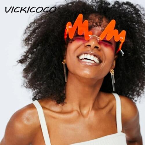 Fashion Unique Wave Punk Sunglasses Women Vintage Rimless Clear Ocean Lens Eyewear Men Irregular Sun Glasses Shades UV400 oculos