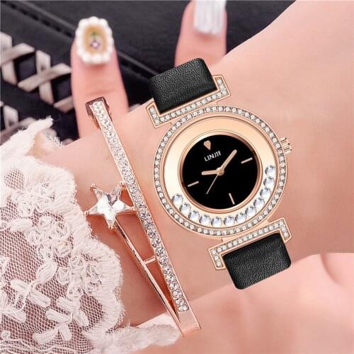 Women Luxury Moving Diamond Watches Ladies Leather Strap Quartz Wristwatches Montre Femme