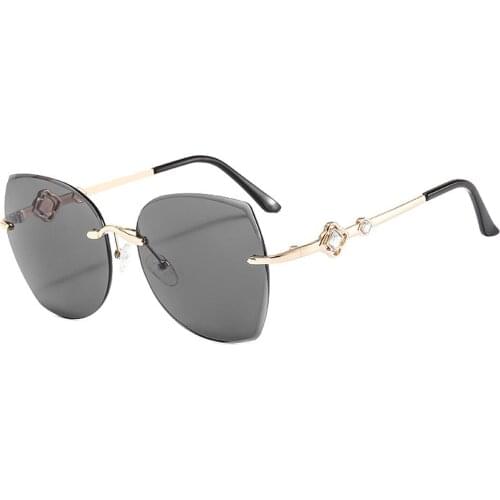 Stylish Trimming Decoration Rimless Women Sunglasses 2021 New Fashion Travel Rhinestone Eyewear Big Frame Sun Glasses Men UV400