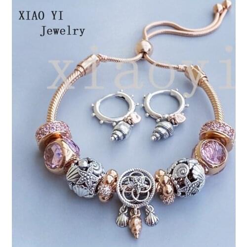 XIAOYI 2020 new 100% s925 Ocean series shell starfish cats eye clasp pull chain shell Earring Set send girlfriend female