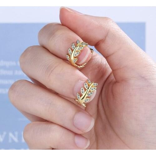 WTLTC Chic 1.3CM Rhinestone Leaves Hoop Earrings for Women Round Charms Huggie Earrings Vinatge Small Tiny Hoops Earrings 2021