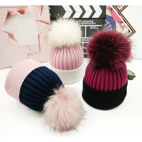 2018 True raccoon ball hat female autumn winter thick wool knitted wool hat Korean version of students color thermal fur gorros