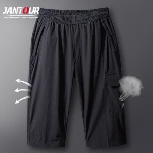 Summer Thin Breathable Mens shorts Pants Loose Straight Beach Male Pure Pocket Knee-length Quick-drying pants Large Size L-8xl