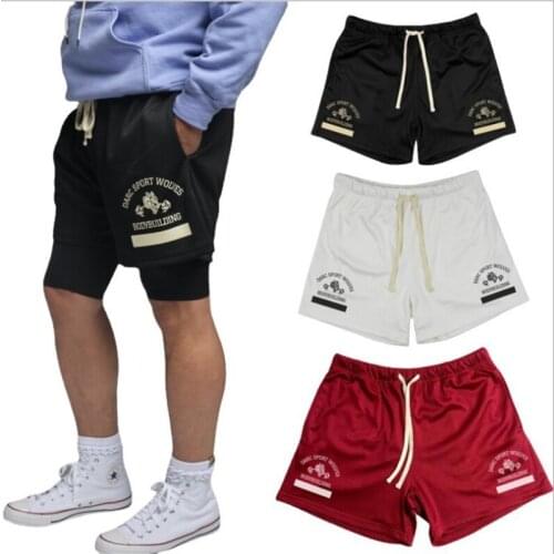 Men summer New style muscle brother Bodybuilding Workout Male Breathable Mesh Quick Dry Sportswear Jogger Beach Short Pants