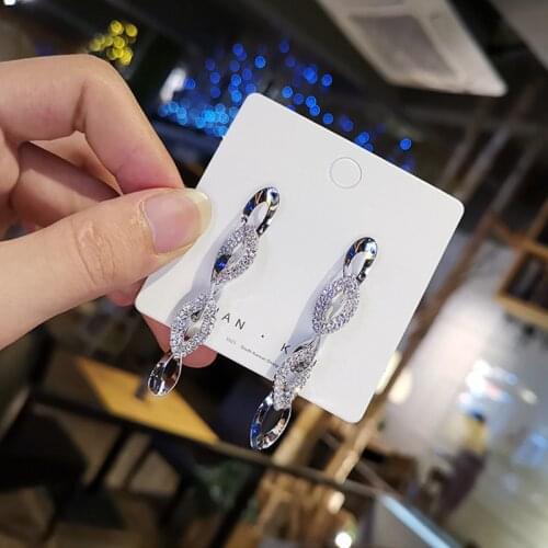 2020 The New Europe And America Shiny Crystal Cutout Tassel Earrings Geometric Pendant Ladies Fashion Long Tassel Earrings