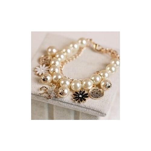 Korean fashion jewelry, horse head mash multilayered petals imitation pearls bracelet women For Women