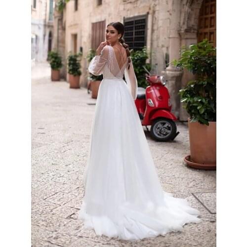 V Neck Beading Wedding Dress with Tassles Long Plus Size Puff Sleeves Tulle A Line Crisscross 2021 Bridal Gown Vestido De Noiva
