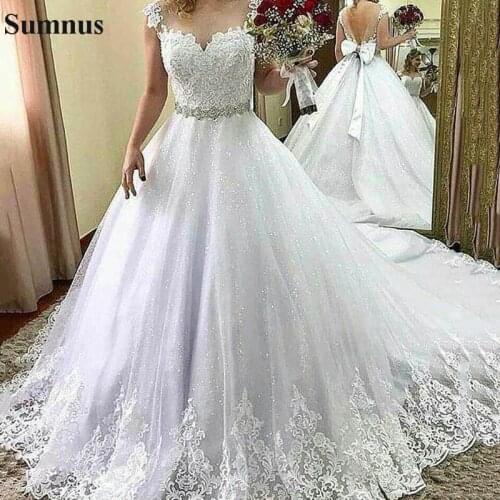Sumnus Ball Gown Wedding Dress With Bow Lace Appliques Beading Belt Cap Sleeve Bridal Dress Glitter Princess Bridal Dress