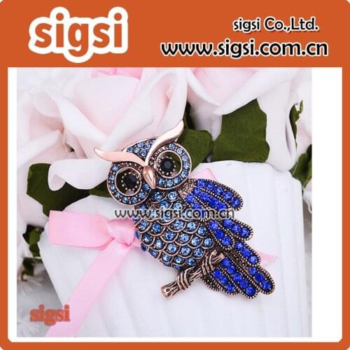 Blue rhinestone owl brooch