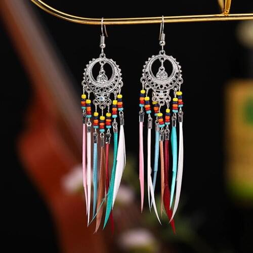 2021 New Fashion Retro Hollow Long Feather Earrings Hot Sale Colorful Rice Bead Tassel Earrings Bohemia Jewelry Accessories