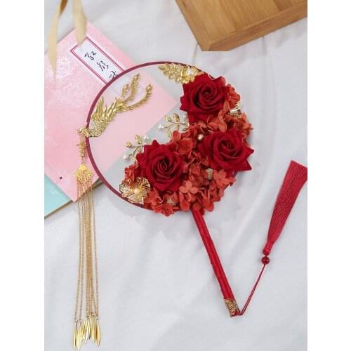 Wedding Chinese bride holding flowers