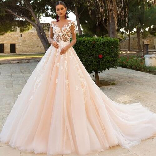 O Neck Full Sleeves Illusion Button A-Line Wedding Dresses Crystal Beading Appliqued Flowers 2021 Floor Length Bridal Gown
