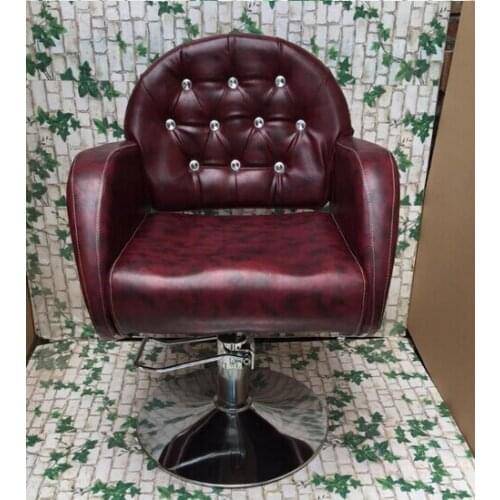 The barber chair. Hairdressing chair. Hydraulic chairs hairdressing chair