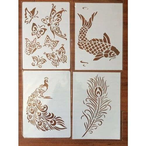 4pcs / set A4 Peacock feather fish butterfly Stencils Painting Coloring Embossing Scrapbook Album Decorative Template