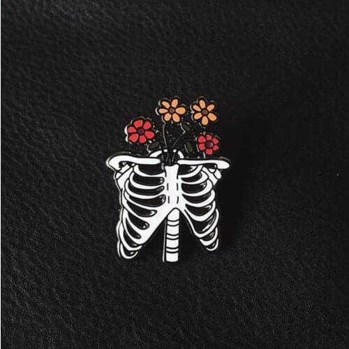 Ribs with flowers skeleton enamel pin badge