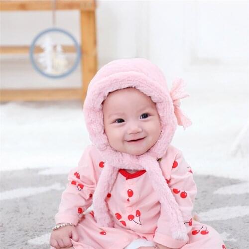 New winter fashion Plush childrens hat babys thickened warm pullover hat bow Plush earmuff Baby Hat Baby Photo Peishi
