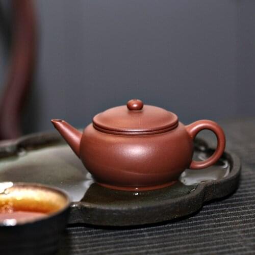 Purple clay teapot small tea set raw ore pure manual bottom trough clear water flat teapot old factory sample 150cc