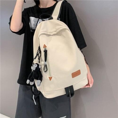 2021 new cute college wind school bag day students contracted pure color pair backpack orangutan pendant waterproof backpack