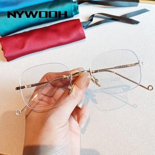 NYWOOH Computer Anti Blue Light Glasses Frames Men Rimless Eyeglasses for Women Retro Metal Optical Frame