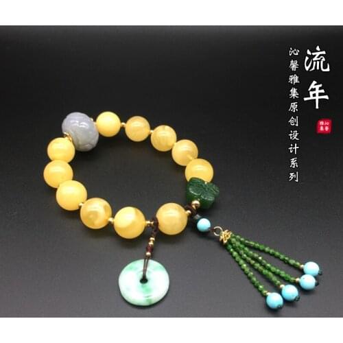 Collection of original design time 】 the beeswax round bead jade lulutong peace buckle the stupa hand string bracelet