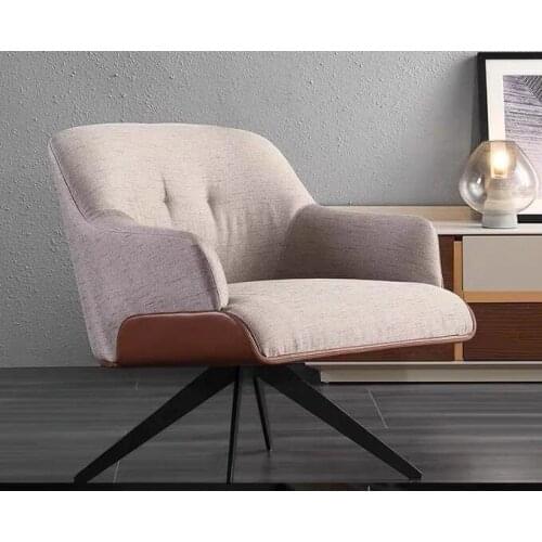 Italian minimalist fabric lounge chair, light luxury modern with armrests, designer creative stainless steel bracket sofa chair