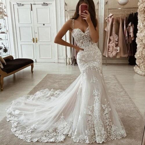 2021 New Arabic Mermaid Wedding Dresses Spaghetti Straps Illusion Lace Appliques Court Train Tulle Plus Size Formal