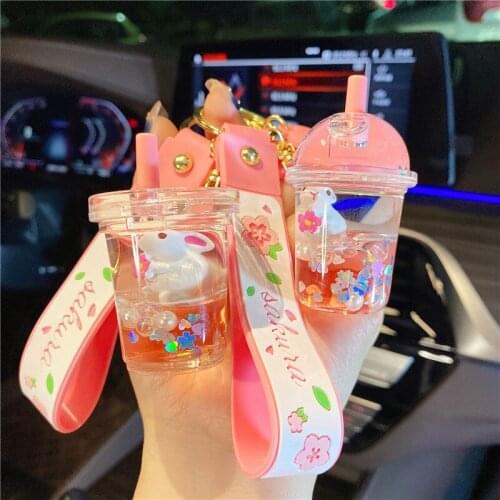 Creative Cute Sakura Rabbit Keychain Floating Oil Floating Bottle Key Chain Gift