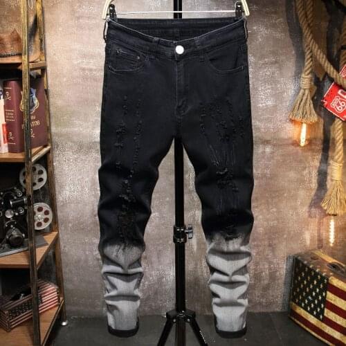 Designer Black White Gradient Jeans Men New Stretch Hit Color Stitching Frayed Ripped Hole Feet Pants Streetwear Denim Trousers