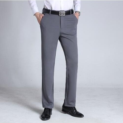 Four Seasons New MenS Plus Size Suit Pants Korean Fashion Business Casual Loose Stretch Trousers Male Oversized Brand Clothes