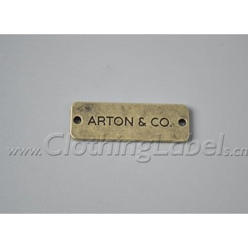 Custom metal tag labels for clothing anti brass color zinc alloy material accessories etc. engraved logo with holes at each side